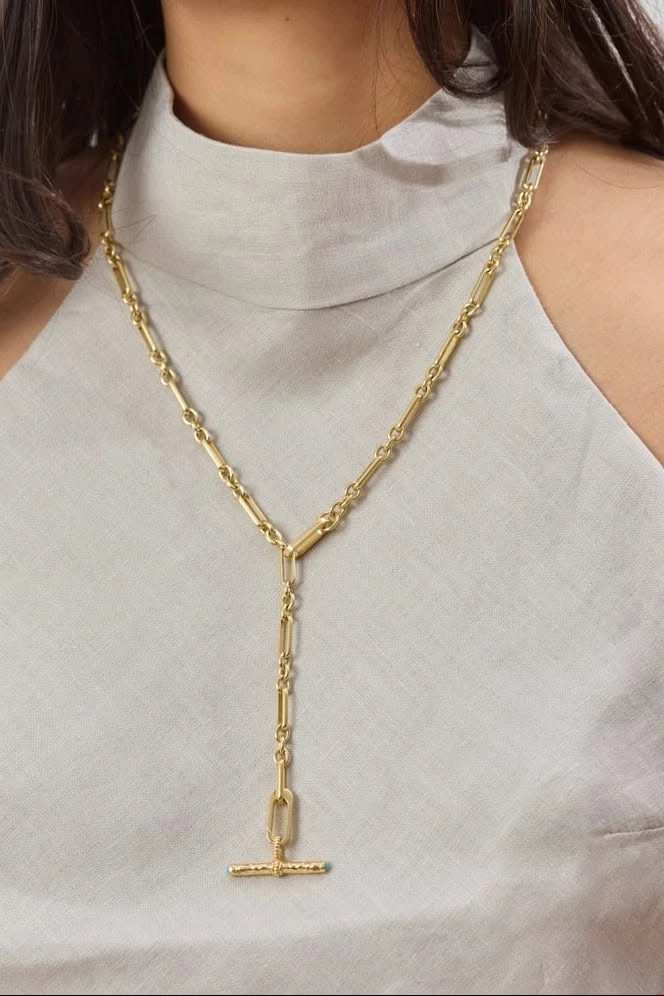 Collar con barra en T