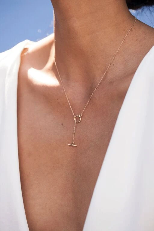 Collar con barra en T