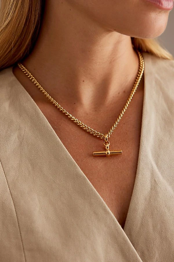 Collar con barra en T