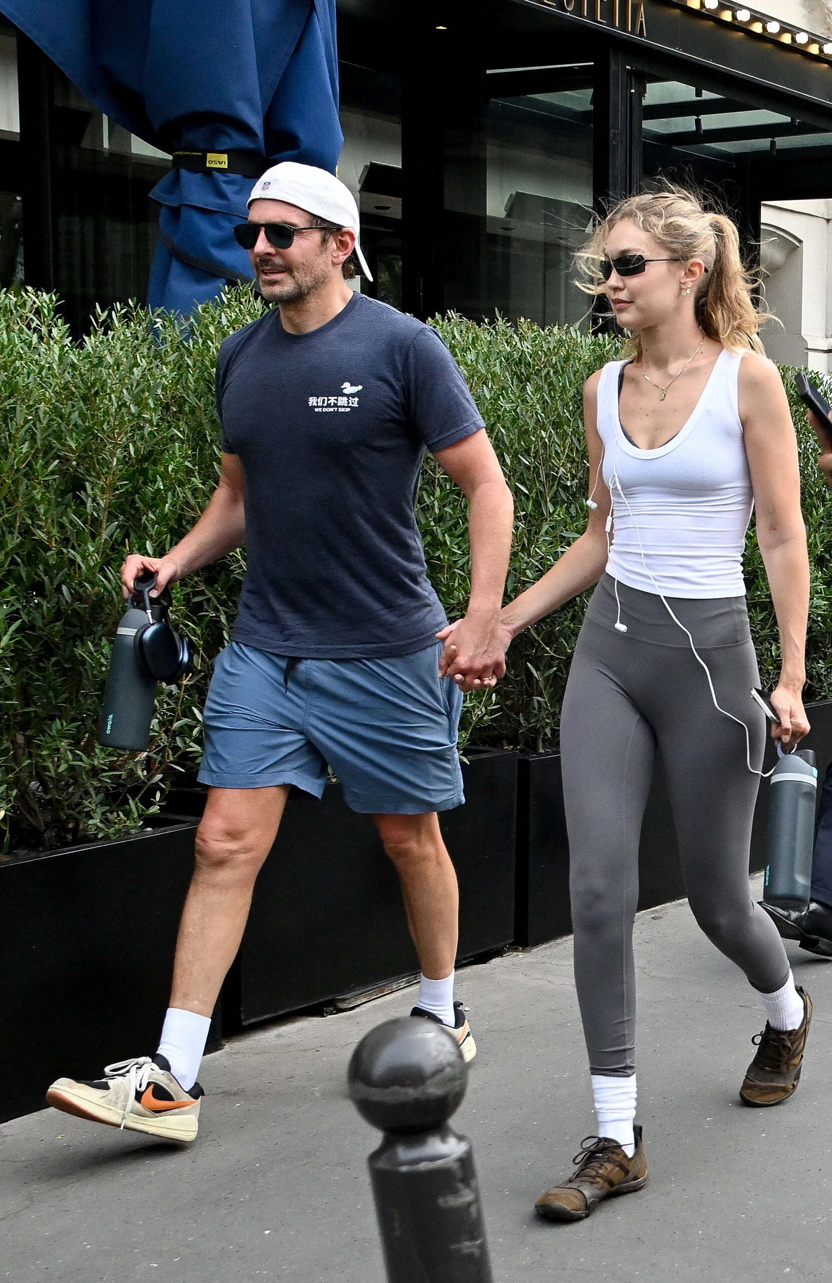 Bradley Cooper and Gigi Hadid in Paris with sporty looks.